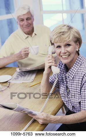 people, telephone, talking, couple, senior, magazine, phone View Large Photo Image Stock Image - people, telephone, talking, couple, senior, magazine, phone. Fotosearch