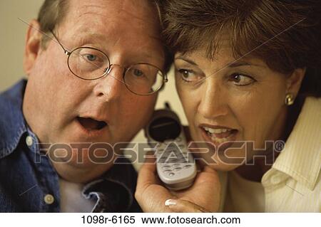 people, telephone, talking, couple, eyeglasses, phone, Middle-aged View Large Photo Image Stock Photography - people, telephone, talking, couple, eyeglasses, phone, Middle-aged. Fotosearch