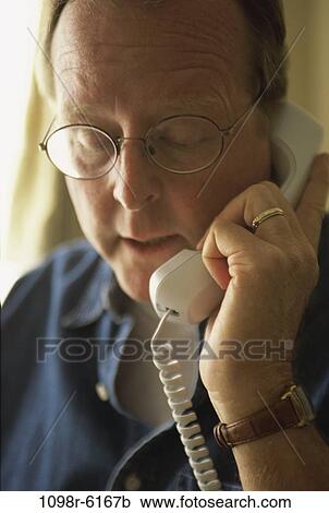 people, telephone, talking, eyeglasses, phone, Middle-aged View Large Photo Image Stock Image - people, telephone, talking, eyeglasses, phone, Middle-aged. Fotosearch