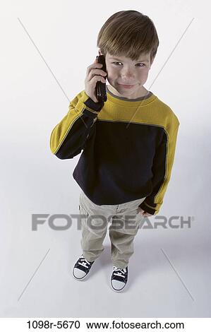 people, telephone, talking, phone, boy, child, brunette View Large Photo Image Stock Image - people, telephone, talking, phone, boy, child, brunette. Fotosearch