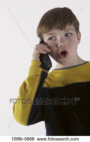 people, telephone, talking, phone, boy, child, brunette View Large Photo Image Stock Photo - people, telephone, talking, phone, boy, child, brunette. Fotosearch
