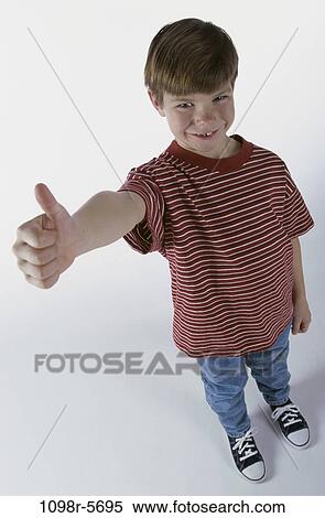 people, thumb, boy, achievement, child, jeans, T-shirt View Large Photo Image Stock Photography - people, thumb, boy, achievement, child, jeans, T-shirt. Fotosearch