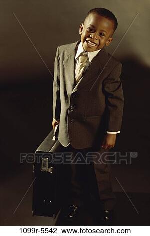 people, tie, briefcase, suit, boy, costume, business View Large Photo Image Stock Image - people, tie, briefcase, suit, boy, costume, business. Fotosearch