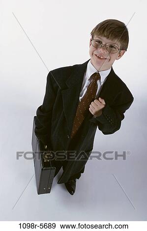 Stock Photo - people, tie, briefcase, suit, eyeglasses, boy, business. Fotosearch
