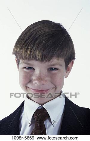 Stock Photo - people, tie, suit, boy, business, posing, indoors. Fotosearch