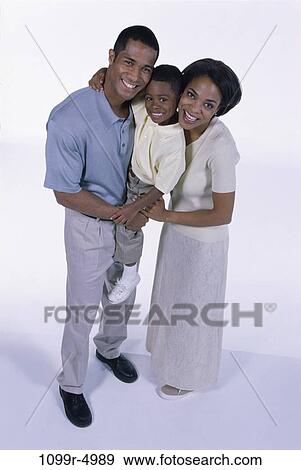 people, unity, family, portrait, parents, indoors View Large Photo Image Stock Photo - people, unity, family, portrait, parents, indoors. Fotosearch