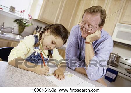 people, watch, homework, watching, family, kitchen, helping View Large Photo Image Stock Image - people, watch, homework, watching, family, kitchen, helping. Fotosearch
