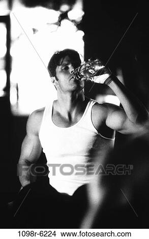 people, water, bottle, Hispanic, drinking, exercise View Large Photo Image Picture - people, water, bottle, Hispanic, drinking, exercise. Fotosearch
