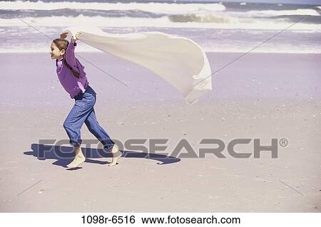 people, water, running, ocean, windy, wind View Large Photo Image Stock Photograph - people, water, running, ocean, windy, wind. Fotosearch