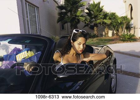 people, woman, Asian, car, convertible, sunglasses, outdoors View Large Photo Image Stock Image - people, woman, Asian, car, convertible, sunglasses, outdoors. Fotosearch