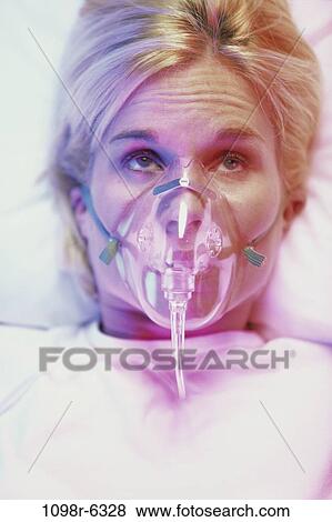 people, woman, bed, patient, mask, health, Middle-aged View Large Photo Image Stock Photo - people, woman, bed, patient, mask, health, Middle-aged. Fotosearch