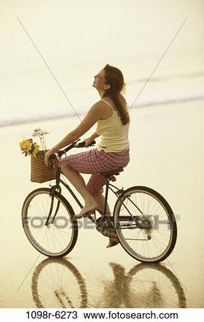 people, woman, bicycle, outdoors, cycling, brunette View Large Photo Image Stock Image - people, woman, bicycle, outdoors, cycling, brunette. Fotosearch