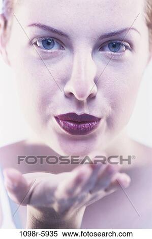 people, woman, blowing, indoors, redhead, Caucasian, blow View Large Photo Image Stock Photography - people, woman, blowing, indoors, redhead, Caucasian, blow. Fotosearch