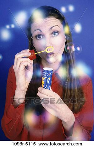 people, woman, bubbles, brunette, indoors, Caucasian, young adult View Large Photo Image Stock Photography - people, woman, bubbles, brunette, indoors, Caucasian, young adult. Fotosearch