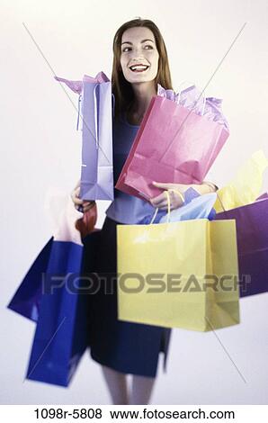 people, woman, carrying, shopping, shop, bags, shopping bags View Large Photo Image Stock Photo - people, woman, carrying, shopping, shop, bags, shopping bags. Fotosearch