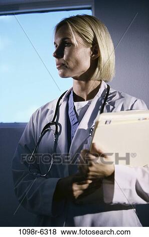 people, woman, charts, window, doctor, stethoscope, occupations View Large Photo Image Stock Photo - people, woman, charts, window, doctor, stethoscope, occupations. Fotosearch