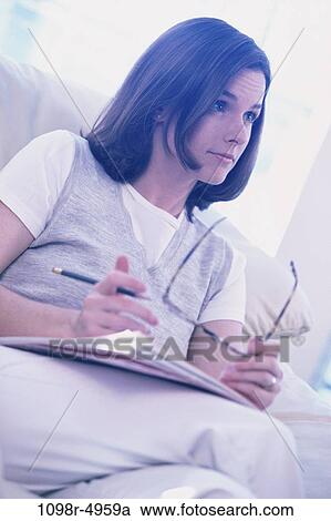 people, woman, eyeglasses, brunette, indoors, Caucasian, young adult View Large Photo Image Stock Image - people, woman, eyeglasses, brunette, indoors, Caucasian, young adult. Fotosearch
