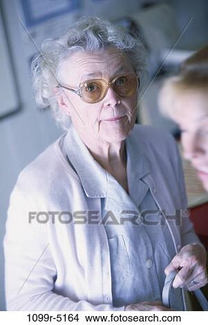 people, woman, eyeglasses, senior, apprehension, apprehensive, nervous View Large Photo Image Picture - people, woman, eyeglasses, senior, apprehension, apprehensive, nervous. Fotosearch