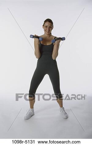 people, woman, healthy, health, sports, exercise, weights View Large Photo Image Stock Image - people, woman, healthy, health, sports, exercise, weights. Fotosearch