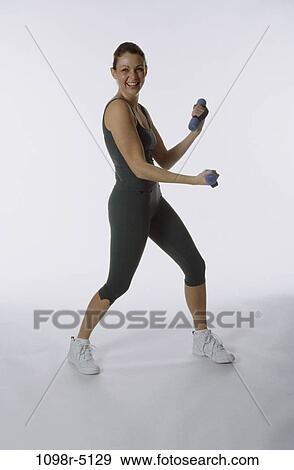 Stock Photo - people, woman, healthy, health, sports, exercise, weights. Fotosearch