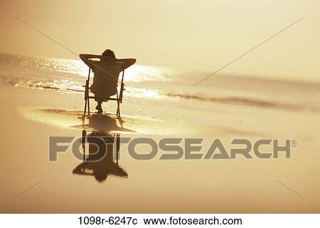 people, woman, isolation, beach, tranquility, relaxing View Large Photo Image Stock Image - people, woman, isolation, beach, tranquility, relaxing. Fotosearch