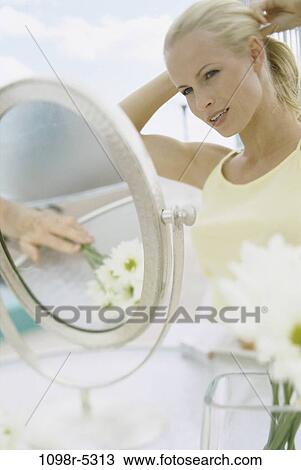 people, woman, mirror, blond, beauty, indoors, Caucasian View Large Photo Image Stock Image - people, woman, mirror, blond, beauty, indoors, Caucasian. Fotosearch