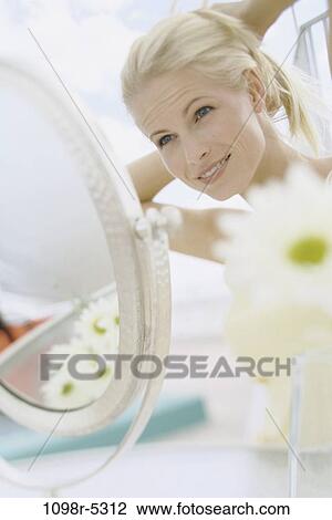 people, woman, mirror, blond, indoors, Caucasian, young adult View Large Photo Image Stock Image - people, woman, mirror, blond, indoors, Caucasian, young adult. Fotosearch