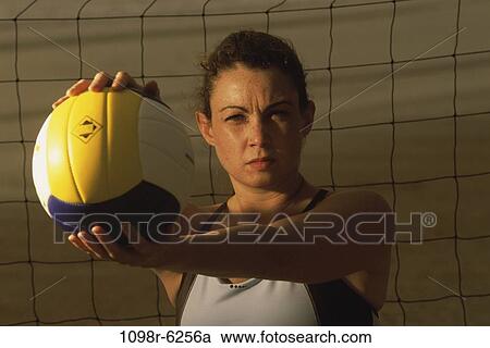 people, woman, playing, concentration, holding, concentrating View Large Photo Image Stock Image - people, woman, playing, concentration, holding, concentrating. Fotosearch