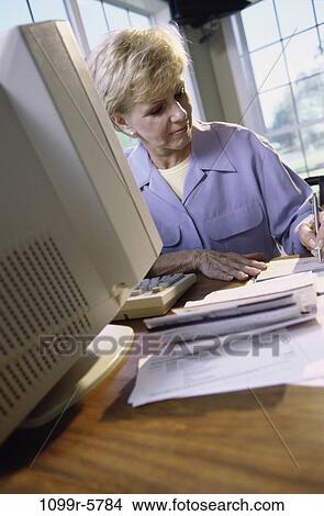 people, woman, senior, computer, blond, finance, personal finance View Large Photo Image Picture - people, woman, senior, computer, blond, finance, personal finance. Fotosearch