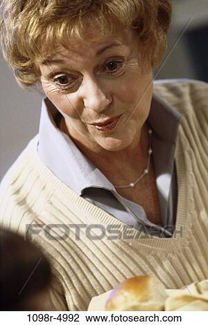 people, woman, senior, indoors, Caucasian, One senior indoors View Large Photo Image Stock Image - people, woman, senior, indoors, Caucasian, One senior indoors. Fotosearch