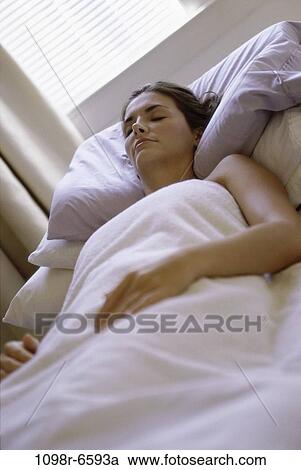 people, woman, sleeping, bed, relaxing, resting, brunette View Large Photo Image Stock Image - people, woman, sleeping, bed, relaxing, resting, brunette. Fotosearch