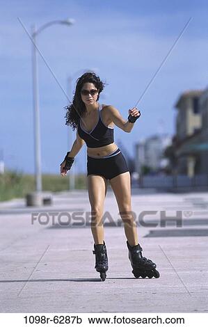 people, woman, sunglasses, outdoors, brunette, skating, Caucasian View Large Photo Image Stock Image - people, woman, sunglasses, outdoors, brunette, skating, Caucasian. Fotosearch