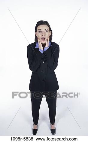 people, woman, surprise, brunette, indoors, Caucasian, young adult View Large Photo Image Stock Photo - people, woman, surprise, brunette, indoors, Caucasian, young adult. Fotosearch