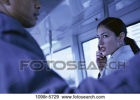 people, woman, telephone, talking, phone, train, transportation View Large Photo Image Stock Photo - people, woman, telephone, talking, phone, train, transportation. Fotosearch