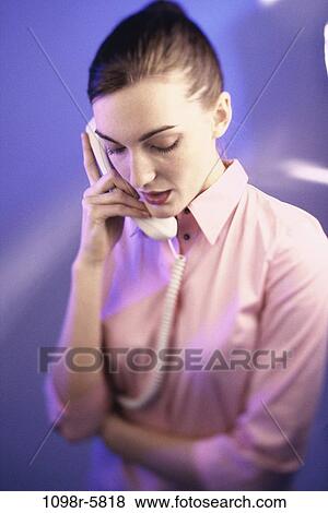 people, woman, telephone, talking, phone, serious, brunette View Large Photo Image Stock Photo - people, woman, telephone, talking, phone, serious, brunette. Fotosearch