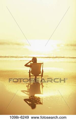 people, woman, telephone, talking, chair, phone, beach View Large Photo Image Stock Photo - people, woman, telephone, talking, chair, phone, beach. Fotosearch