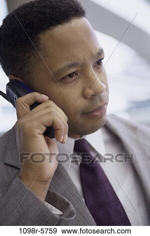 phone, business, outdoors, Middle-aged, cell phone, businessman View Large Photo Image Stock Photo - phone, business, outdoors, Middle-aged, cell phone, businessman. Fotosearch