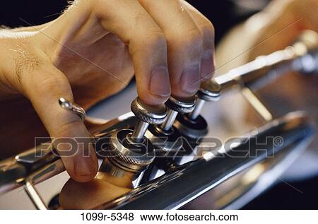 playing, horn, arts, entertainment, body parts, fingers, play View Large Photo Image Stock Photo - playing, horn, arts, entertainment, body parts, fingers, play. Fotosearch