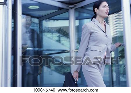 reflection, glass, walking, briefcase, door, Hispanic View Large Photo Image Stock Image - reflection, glass, walking, briefcase, door, Hispanic. Fotosearch