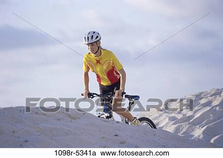 sand, people, woman, dunes, helmet, beach, outdoors View Large Photo Image Stock Image - sand, people, woman, dunes, helmet, beach, outdoors. Fotosearch