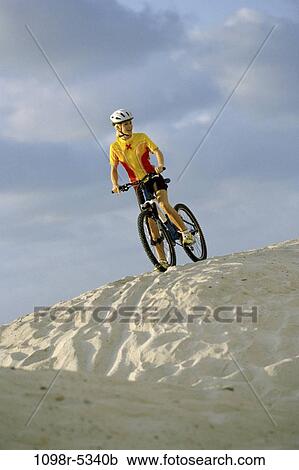 sand, people, woman, outdoors, Middle-aged, bike, cycling View Large Photo Image Stock Image - sand, people, woman, outdoors, Middle-aged, bike, cycling. Fotosearch