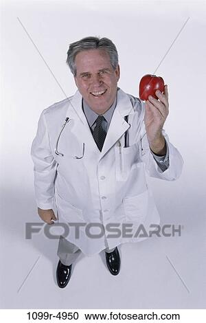 senior, healthy, apple, fruit, holding, doctor View Large Photo Image Stock Image - senior, healthy, apple, fruit, holding, doctor. Fotosearch