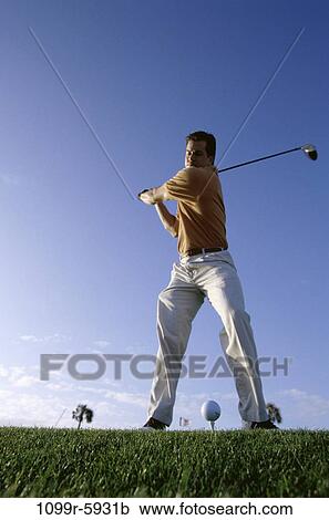 Stock Image - sky, playing, golf, ball, Middle-aged, club. Fotosearch