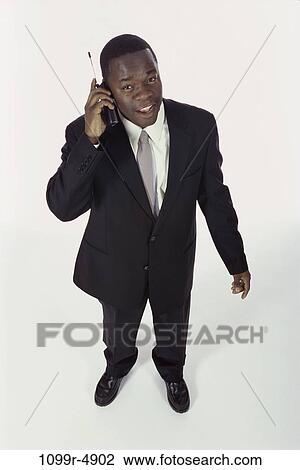 talking, business, cell phone, businessman, indoors, talk View Large Photo Image Stock Image - talking, business, cell phone, businessman, indoors, talk. Fotosearch