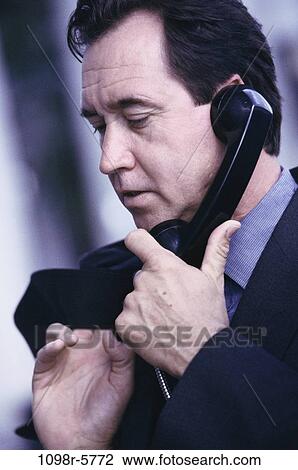 talking, phone, business, Middle-aged, serious, obsolete View Large Photo Image Stock Image - talking, phone, business, Middle-aged, serious, obsolete. Fotosearch