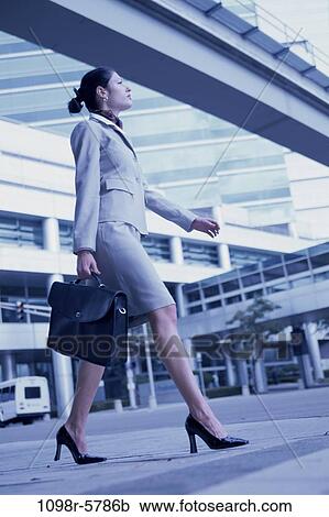 woman, briefcase, Hispanic, business, outdoors, Middle-aged, businesswoman View Large Photo Image Stock Image - woman, briefcase, Hispanic, business, outdoors, Middle-aged, businesswoman. Fotosearch