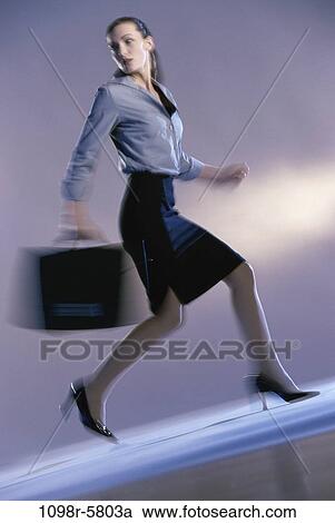 woman, briefcase, rush, business, indoors, Caucasian, businesswoman View Large Photo Image Stock Image - woman, briefcase, rush, business, indoors, Caucasian, businesswoman. Fotosearch