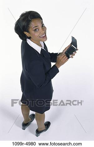 woman, computer, holding, business, Middle-aged, using, hold View Large Photo Image Stock Image - woman, computer, holding, business, Middle-aged, using, hold. Fotosearch