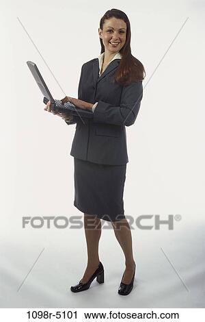 woman, computer, laptop, typing, holding, business, Middle-aged View Large Photo Image Stock Image - woman, computer, laptop, typing, holding, business, Middle-aged. Fotosearch
