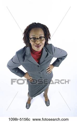 Stock Image - woman, eyeglasses, business, indoors, African-American, businesswoman, young adult. Fotosearch